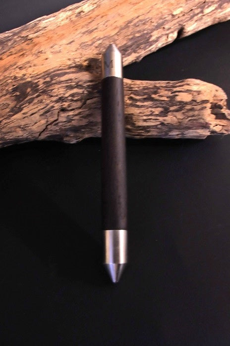 Painstick aus schwarzem Designholz